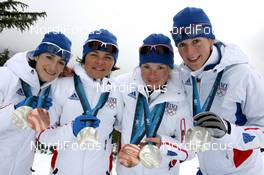 25.02.2010, Whistler, Canada (CAN): Team France with (L-R) Marie Laure Brunet (FRA), Rossignol, Rottefella, Swix, Odlo, Sylvie Becaert (FRA), Fischer, Rottefella, Exel, Odlo, Marie Dorin (FRA), Rossignol, Rottefella, Exel, Odlo and Sandrine Bailly (FRA), Madshus, Rottefella, Swix, Odlo - Olympic Winter Games Vancouver 2010, biathlon, medals, Whistler (CAN). www.nordicfocus.com. © NordicFocus. Every downloaded picture is fee-liable.