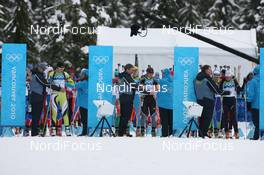 16.02.2010, Whistler, Canada (CAN): Athletes wait for start: (L-R) Anastasiya Kuzmina (SVK), Fischer, Salomon, Exel, Magdalena Neuner (GER), Fischer, Rottefella, Exel, adidas, Marie Dorin (FRA), Rossignol, Rottefella, Exel, Odlo - Olympic Winter Games Vancouver 2010, biathlon, pursuit women, Whistler (CAN). www.nordicfocus.com. © NordicFocus. Every downloaded picture is fee-liable.