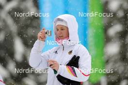 26.02.2010, Whistler, Canada (CAN): Miriam Goessner (GER), taking pictures - Olympic Winter Games Vancouver 2010, biathlon, relay men, Whistler (CAN). www.nordicfocus.com. © NordicFocus. Every downloaded picture is fee-liable.