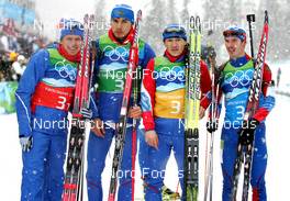 26.02.2010, Whistler, Canada (CAN): Group l-r: Ivan Tcherezov (RUS), Madshus, Rottefella, Exel, adidas, Anton Shipulin (RUS), Madshus, Rottefella, adidas, Maxim Tchoudov (RUS), Fischer, Salomon, adidas, Evgeny Ustyugov (RUS), Madshus, Swix, adidas - Olympic Winter Games Vancouver 2010, biathlon, relay men, Whistler (CAN). www.nordicfocus.com. © NordicFocus. Every downloaded picture is fee-liable.
