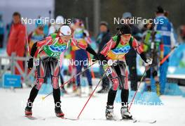 23.02.2010, Whistler, Canada (CAN): l-r: Zina Kocher (CAN), Atomic, Odlo, Rosanna Crawford (CAN), Salomon, Leki, Odlo  - Olympic Winter Games Vancouver 2010, biathlon, relay women, Whistler (CAN). www.nordicfocus.com. © NordicFocus. Every downloaded picture is fee-liable.