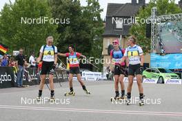 08.08.2010, Puettlingen, Germany (GER): Crossing the last finish line: Sandra Keith (CAN), Madshus, Rottefella, Simone Hauswald (GER), Fischer, Rottefella, Exel, adidas, Toko, Sandrine Bailly (FRA), Madshus, Rottefella, Swix, Odlo, Kati Wilhelm (GER), Madshus, Rottefella, Swix, adidas - 6th ODLO City Biatlon, Puettlingen (GER). www.nordicfocus.com. © Manzoni/NordicFocus. Every downloaded picture is fee-liable.