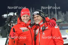 01.12.2010, Oestersund, Sweden (SWE): Steffen Hauswald (GER), head coach team Switzerland  and Tobias Torgersen (NOR), coach Team Switzerland - IBU world cup biathlon, individual women, Oestersund (SWE). www.nordicfocus.com. © Manzoni/NordicFocus. Every downloaded picture is fee-liable.