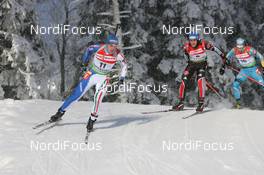 05.12.2010, Oestersund, Sweden (SWE): Lukas Hofer (ITA), Rossignol, Rottefella, Exel leads Michael Greis (GER), Madshus, Rottefella, Exel, adidas - IBU world cup biathlon, pursuit men, Oestersund (SWE). www.nordicfocus.com. © Manzoni/NordicFocus. Every downloaded picture is fee-liable.