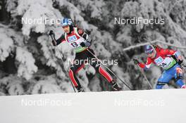 05.12.2010, Oestersund, Sweden (SWE): Kathrin Hitzer (GER), Madshus, Rottefella, Swix, adidas and Svetlana Sleptsova (RUS), Fischer, Rottefella, Alpina, Swix, adidas - IBU world cup biathlon, pursuit women, Oestersund (SWE). www.nordicfocus.com. © Manzoni/NordicFocus. Every downloaded picture is fee-liable.