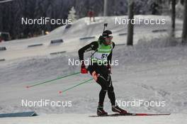 04.12.2010, Oestersund, Sweden (SWE): Simon Hallenbarter (SUI), Madshus, Rottefella, KV+, ODLO - IBU world cup biathlon, sprint men, Oestersund (SWE). www.nordicfocus.com. © Manzoni/NordicFocus. Every downloaded picture is fee-liable.