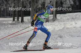 04.12.2010, Oestersund, Sweden (SWE): Mattias Jr. Nilsson (SWE), Rossignol, Rottefella, Leki, adidas - IBU world cup biathlon, sprint men, Oestersund (SWE). www.nordicfocus.com. © Manzoni/NordicFocus. Every downloaded picture is fee-liable.