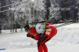 04.12.2010, Oestersund, Sweden (SWE): Lars Berger (NOR), Madshus, Salomon, Swix, Odlo - IBU world cup biathlon, sprint men, Oestersund (SWE). www.nordicfocus.com. © Manzoni/NordicFocus. Every downloaded picture is fee-liable.
