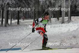 04.12.2010, Oestersund, Sweden (SWE): Simon Eder (AUT), Fischer, Rottefella, Swix - IBU world cup biathlon, sprint men, Oestersund (SWE). www.nordicfocus.com. © Manzoni/NordicFocus. Every downloaded picture is fee-liable.