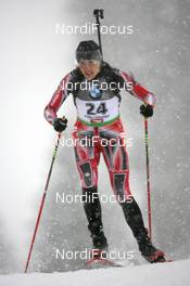 10.12.2010, Hochfilzen, Austria (AUT): Zina Kocher (CAN), Atomic, Leki, Odlo - IBU world cup biathlon, sprint women, Hochfilzen (AUT). www.nordicfocus.com. © Manzoni/NordicFocus. Every downloaded picture is fee-liable.