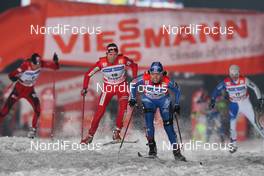 04.01.2010, Prag, Czech Republic (CZE): group, ladies final, in front Natalia Korosteleva (RUS), Madshus, Rottefella, Swix, adidas, behind Celine Brun-Lie (NOR), Fischer, Rottefella, Alpina, Swix  - FIS world cup cross-country, tour de ski, individual sprint, Prag (CZE). www.nordicfocus.com. © Hemmersbach/NordicFocus. Every downloaded picture is fee-liable.