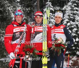 10.01.2010, Val di Fiemme, Italy (ITA): podium TdS sprint ranking, l-r: Simen Oestensen (NOR), Petter Northug (NOR), Fischer, Rottefella, Alpina, Ski Go, Swix, Marcus Hellner (SWE), Fischer, Salomon, Exel, Craft  - FIS world cup cross-country, tour de ski, final climb men, Val di Fiemme (ITA). www.nordicfocus.com. © Hemmersbach/NordicFocus. Every downloaded picture is fee-liable.