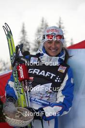 10.01.2010, Val di Fiemme, Italy (ITA): TdS overall 3rd Arianna Follis (ITA), Fischer, Salomon, Swix  - FIS world cup cross-country, tour de ski, final climb women, Val di Fiemme (ITA). www.nordicfocus.com. © Hemmersbach/NordicFocus. Every downloaded picture is fee-liable.