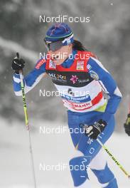 09.01.2010, Val di Fiemme, Italy (ITA): Aino Kaisa Saarinen (FIN), Rossignol, Rottefella, One Way  - FIS world cup cross-country, tour de ski, mass women, Val di Fiemme (ITA). www.nordicfocus.com. © Hemmersbach/NordicFocus. Every downloaded picture is fee-liable.
