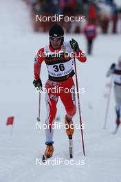 16.01.2010, Otepaeae, Estland (EST): Nobu Naruse (JPN), Fischer, Rottefella  - FIS world cup cross-country, 15km men, Otepaeae (EST). www.nordicfocus.com. © Hemmersbach/NordicFocus. Every downloaded picture is fee-liable.