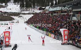 13.03.2010, Holmenkollen, Norway (NOR): finish, Marit Bjoergen (NOR), Fischer, Rottefella, Swix in front of Kristin Stoermer Steira (NOR), Madshus, Rottefella, One Way, Swix and Therese Johaug (NOR), Fischer, Salomon, Swix  - FIS world cup cross-country, 30km women, Holmenkollen (NOR). www.nordicfocus.com. © Hemmersbach/NordicFocus. Every downloaded picture is fee-liable.