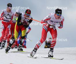 13.03.2010, Holmenkollen, Norway (NOR): group, in front George Grey (CAN), Fischer  - FIS world cup cross-country, 50km men, Holmenkollen (NOR). www.nordicfocus.com. © Hemmersbach/NordicFocus. Every downloaded picture is fee-liable.