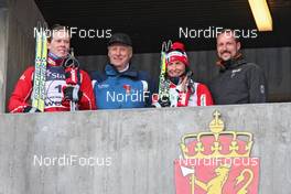 14.03.2010, Holmenkollen, Norway (NOR): group, l-r: Anders Gloersen (NOR), Fischer, King Harald V. of Norway, Marit Bjoergen (NOR), Fischer, Rottefella, Swix, Crownprince Haakon of Norway - FIS world cup cross-country, individual sprint, Holmenkollen (NOR). www.nordicfocus.com. © Hemmersbach/NordicFocus. Every downloaded picture is fee-liable.