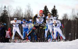 20.03.2010, Falun, Sweden (SWE): l-r: Marcus Hellner (SWE), Fischer, Salomon, Exel, Craft, Tobias Angerer (GER), Rossignol, Rottefella, One Way, adidas, Girogio di Centa (ITA), Atomic, Swix, Rudy Project  - FIS world cup cross-country, pursuit men, Falun (SWE). www.nordicfocus.com. © Felgenhauer/NordicFocus. Every downloaded picture is fee-liable.