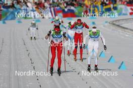 17.02.2010, Whistler, Canada (CAN): (L-R) Justyna Kowalczyk (POL), Fischer, Salomon, Swix wins agains Anna Olsson (SWE), Fischer, Salomon and Celine Brun-Lie (NOR), Fischer, Rottefella, Alpina, Swix - Olympic Winter Games Vancouver 2010, cross-country, individual sprint, Whistler (CAN). www.nordicfocus.com. © NordicFocus. Every downloaded picture is fee-liable.