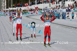 17.02.2010, Whistler, Canada (CAN): Marit Bjoergen (NOR), Fischer, Rottefella, Swix (right) wins the sprint on the finish line agains Justyna Kowalczyk (POL), Fischer, Salomon, Swix and Petra Majdic (SLO), Fischer, Rottefella, Alpina, One Way - Olympic Winter Games Vancouver 2010, cross-country, individual sprint, Whistler (CAN). www.nordicfocus.com. © NordicFocus. Every downloaded picture is fee-liable.