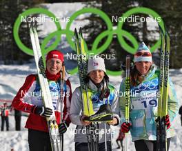 17.02.2010, Whistler, Canada (CAN): podium, l-r: Justyna Kowalczyk (POL), Fischer, Salomon, Swix, Marit Bjoergen (NOR), Fischer, Rottefella, Swix, Petra Majdic (SLO), Fischer, Rottefella, Alpina, One Way  - Olympic Winter Games Vancouver 2010, cross-country, individual sprint, Whistler (CAN). www.nordicfocus.com. © NordicFocus. Every downloaded picture is fee-liable.