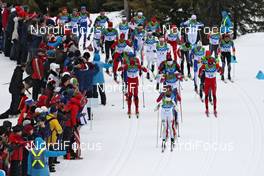 28.02.2010, Whistler, Canada (CAN): group, in front Johan Olsson (SWE), Madshus, Salomon, Leki, Craft, behind Lukas Bauer (CZE), Fischer, Rottefella, Alpina, Swix, Toko  - Olympic Winter Games Vancouver 2010, cross-country, mass men, Whistler (CAN). www.nordicfocus.com. © NordicFocus. Every downloaded picture is fee-liable.