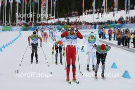 28.02.2010, Whistler, Canada (CAN): Petter Northug (NOR), Fischer, Rottefella, Alpina, Ski Go, Swix  wins the 50km mass start agains Axel Teichmann (GER), Madshus, Rottefella, Swix, adidas, Toko - Olympic Winter Games Vancouver 2010, cross-country, mass men, Whistler (CAN). www.nordicfocus.com. © NordicFocus. Every downloaded picture is fee-liable.