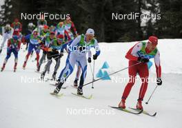 28.02.2010, Whistler, Canada (CAN): l-r: Aivar Rehemaa (EST), Fischer, Salomon, Swix , Dario Cologna (SUI), Fischer, Rottefella, Alpina, Swix, adidas  - Olympic Winter Games Vancouver 2010, cross-country, mass men, Whistler (CAN). www.nordicfocus.com. © NordicFocus. Every downloaded picture is fee-liable.