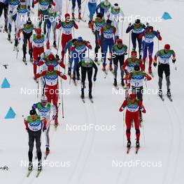 28.02.2010, Whistler, Canada (CAN): group, in front (left): George Grey (CAN), Fischer, right Jens Arne Svartedal (NOR), Atomic, Salomon, Swix, behind him Ivan Babikov (CAN), Salomon, One Way  - Olympic Winter Games Vancouver 2010, cross-country, mass men, Whistler (CAN). www.nordicfocus.com. © NordicFocus. Every downloaded picture is fee-liable.