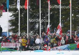 27.02.2010, Whistler, Canada (CAN): Polish fans crashed down a fence - Olympic Winter Games Vancouver 2010, cross-country, mass women, Whistler (CAN). www.nordicfocus.com. © NordicFocus. Every downloaded picture is fee-liable.