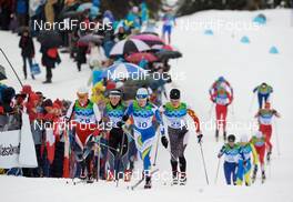 27.02.2010, Whistler, Canada (CAN): Katerina Smutna (AUT), Fischer, Rottefella, Rossignol, Komperdell, Stefanie Boehler (GER), Fischer, Rottefella, Alpina, One Way, adidas, Krista Lahteenmaki (FIN), Madshus, Sara Renner (CAN), Fischer, Salomon  - Olympic Winter Games Vancouver 2010, cross-country, mass women, Whistler (CAN). www.nordicfocus.com. © NordicFocus. Every downloaded picture is fee-liable.