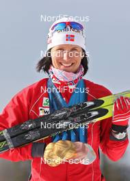 12.03.2010, Whistler, Canada (CAN): Marit Bjoergen (NOR), Fischer, Rottefella, Swix  - Olympic Winter Games Vancouver 2010, cross-country, medals, Whistler (CAN). www.nordicfocus.com. © NordicFocus. Every downloaded picture is fee-liable.