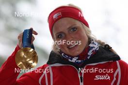 26.02.2010, Whistler, Canada (CAN): Therese Johaug (NOR), Fischer, Salomon, Swix  - Olympic Winter Games Vancouver 2010, cross-country, medals, Whistler (CAN). www.nordicfocus.com. © NordicFocus. Every downloaded picture is fee-liable.
