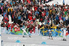 20.02.2010, Whistler, Canada (CAN): Marcus Hellner (SWE), Fischer, Salomon, Exel, Craft, Tobias Angerer (GER), Rossignol, Rottefella, One Way, adidas and Johan Olsson (SWE), Madshus, Salomon, Leki, Craft - Olympic Winter Games Vancouver 2010, cross-country, pursuit men, Whistler (CAN). www.nordicfocus.com. © NordicFocus. Every downloaded picture is fee-liable.