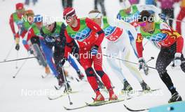24.02.2010, Whistler, Canada (CAN): Group l-r: Martin Johnsrud Sundby (NOR), Fischer, Rottefella, Alpina, Swix, Devon Kershaw (CAN), Fischer, Salomon, Swix - Olympic Winter Games Vancouver 2010, cross-country, 4x10km men, Whistler (CAN). www.nordicfocus.com. © NordicFocus. Every downloaded picture is fee-liable.