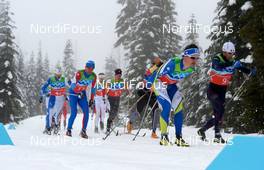 24.02.2010, Whistler, Canada (CAN): l-r: Sami Jauhojaervi (FIN), Fischer, Rottefella, Swix and Jean Marc Gaillard (FRA), Fischer, Rottefella, Swix, Odlo leading the race - Olympic Winter Games Vancouver 2010, cross-country, 4x10km men, Whistler (CAN). www.nordicfocus.com. © NordicFocus. Every downloaded picture is fee-liable.