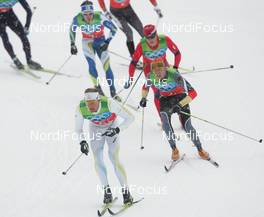 24.02.2010, Whistler, Canada (CAN): Group  Daniel Rickardsson (SWE), Fischer, Salomon, Swix behind Jens Filbrich (GER), Rossignol, Rottefella, One Way, adidas  - Olympic Winter Games Vancouver 2010, cross-country, 4x10km men, Whistler (CAN). www.nordicfocus.com. © NordicFocus. Every downloaded picture is fee-liable.