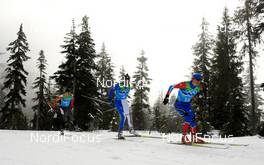 24.02.2010, Whistler, Canada (CAN): l-r: George Grey (CAN), Fischer, Christian Zorzi (ITA), Fischer, Salomon, Swix, Maxim Vylegzhanin (RUS), Fischer, Rottefella, Alpina, Swix, adidas  - Olympic Winter Games Vancouver 2010, cross-country, 4x10km men, Whistler (CAN). www.nordicfocus.com. © NordicFocus. Every downloaded picture is fee-liable.