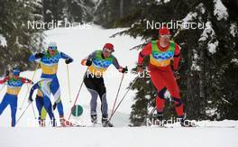 24.02.2010, Whistler, Canada (CAN): l-r: Teemu Kattilakoski (FIN), Peltonen, Rottefella, Alpina, Rene Sommerfeldt (GER), Madshus, Salomon, Leki, adidas, Lars Berger (NOR), Madshus, Swix - Olympic Winter Games Vancouver 2010, cross-country, 4x10km men, Whistler (CAN). www.nordicfocus.com. © NordicFocus. Every downloaded picture is fee-liable.