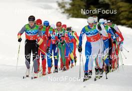 25.02.2010, Whistler, Canada (CAN): l-r: Katrin Zeller (GER), Rossignol, Rottefella, One Way, adidas, Arianna Follis (ITA), Fischer, Salomon, Swix  - Olympic Winter Games Vancouver 2010, cross-country, 4x5km women, Whistler (CAN). www.nordicfocus.com. © NordicFocus. Every downloaded picture is fee-liable.
