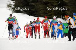 25.02.2010, Whistler, Canada (CAN): l-r: Katrin Zeller (GER), Rossignol, Rottefella, One Way, adidas, Kikkan Randall (USA), Fischer, Salomon, Vibeke W. Skofterud (NOR), Fischer, Rottefella, Alpina, One Way, Swix, Arianna Follis (ITA), Fischer, Salomon, Swix  - Olympic Winter Games Vancouver 2010, cross-country, 4x5km women, Whistler (CAN). www.nordicfocus.com. © NordicFocus. Every downloaded picture is fee-liable.