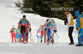 25.02.2010, Whistler, Canada (CAN): l-r: Katrin Zeller (GER), Rossignol, Rottefella, One Way, adidas, Arianna Follis (ITA), Fischer, Salomon, Swix  - Olympic Winter Games Vancouver 2010, cross-country, 4x5km women, Whistler (CAN). www.nordicfocus.com. © NordicFocus. Every downloaded picture is fee-liable.