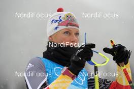 11.02.2010, Whistler, Canada (CAN): Claudia Nystad (GER) cleaning her glasses - Olympic Winter Games Vancouver 2010, cross-country, training, Whistler (CAN). www.nordicfocus.com. © NordicFocus. Every downloaded picture is fee-liable.