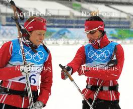 11.02.2010, Whistler, Canada (CAN): l-r: Marthe Kristoffersen (NOR) and Marit Bjoergen (NOR) having fun before training - Olympic Winter Games Vancouver 2010, cross-country, training, Whistler (CAN). www.nordicfocus.com. © NordicFocus. Every downloaded picture is fee-liable.