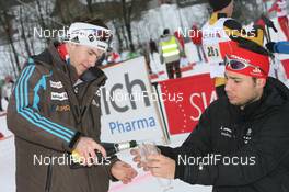 17.01.2010, Marbach, Switzerland (SUI): Champagne for the winters Sebastien Testuz (SUI) and Vincent Cester (SUI) - Swiss National Championships 2010, cross-country, relay men, Marbach (SUI). www.nordicfocus.com. © Manzoni/NordicFocus. Every downloaded picture is fee-liable.