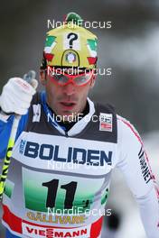 21.11.2010, Gaellivare, Sweden (SWE): Pietro Piller Cottrer (ITA), Rossignol, Rottefella, One Way, Yoko  - FIS world cup cross-country, 4x10km men, Gaellivare (SWE). www.nordicfocus.com. © Hemmersbach/NordicFocus. Every downloaded picture is fee-liable.