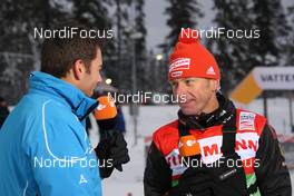 21.11.2010, Gaellivare, Sweden (SWE): Kuno Schreyl (GER), Headcoach Men, Team Germany in TV-Interview (ZDF) - FIS world cup cross-country, 4x10km men, Gaellivare (SWE). www.nordicfocus.com. © Hemmersbach/NordicFocus. Every downloaded picture is fee-liable.
