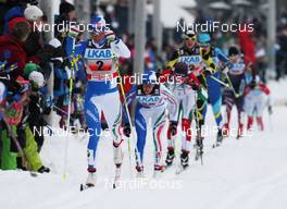 21.11.2010, Gaellivare, Sweden (SWE): group, in front Magda Genuin (ITA), Rossignol, Rottefella, One Way, behind Virginia de Martin Topranin (ITA) - FIS world cup cross-country, 4x5km women, Gaellivare (SWE). www.nordicfocus.com. © Hemmersbach/NordicFocus. Every downloaded picture is fee-liable.