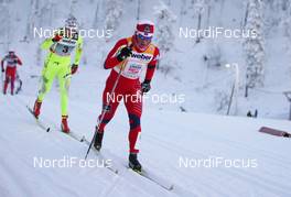 26.11.2010, Kuusamo, Finland (FIN) : Marit Bjoergen (NOR), Fischer, Rottefella, Swix, behind Petra Majdic (SLO), Fischer, Rottefella, Alpina, One Way  - FIS world cup cross-country, individual sprint, Kuusamo (FIN). www.nordicfocus.com. © Laiho/NordicFocus. Every downloaded picture is fee-liable.
